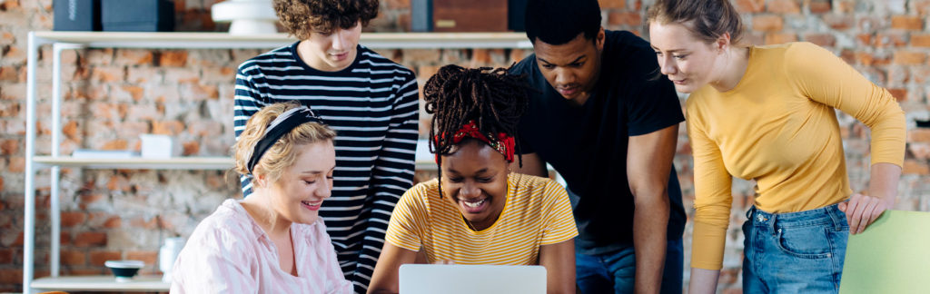 People looking at laptop